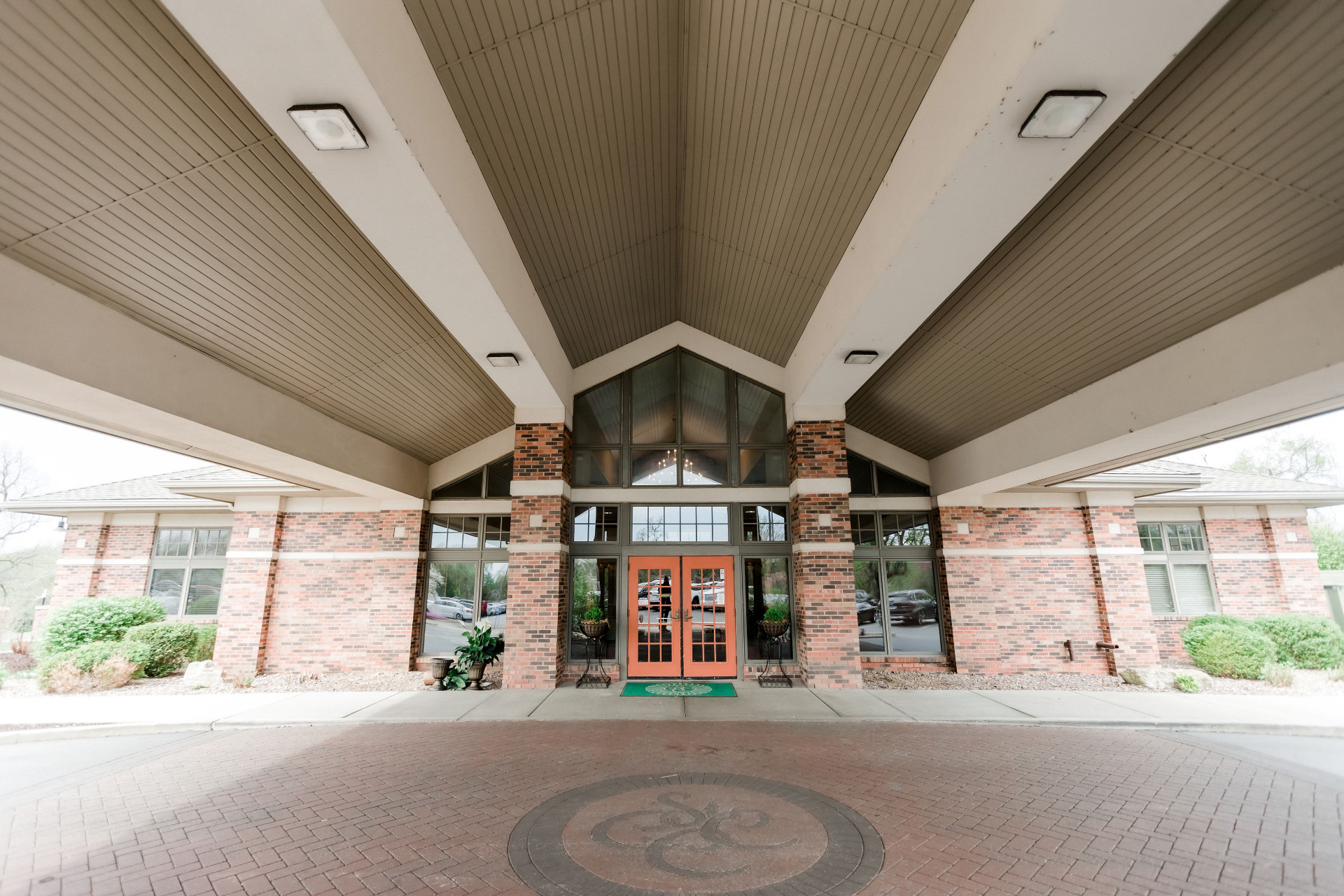 Brick-building-entrance-doors-canopy-design-St_-Clair-Country-Club